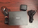 Axacore Faxbridge FXB21 Network Appliance With Power Adapter And Cables Used. Price: $35.00.